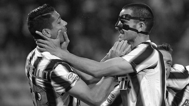 Juventus' Marco Borriello (L) celebrates with his teammate Leonardo Bonucci, wearing a faceguard, after scoring against Cagliari during their Serie A soccer match at the Nereo Rocco stadium in Trieste May 6, 2012.  REUTERS/Giorgio Perottino  (ITALY - Tags: SPORT SOCCER)