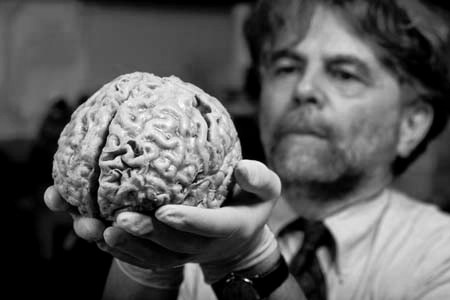 Neuroscience professor Ron Kalil holding a human brain specimen that is being studied in his Medical School research lab.©UW-Madison University Communications 608/262-0067Photo by: Jeff MillerDate:  05/00     File#:   color slide