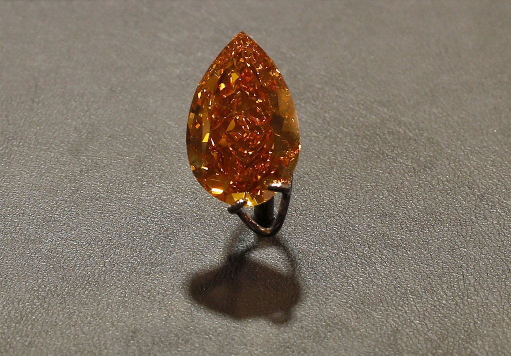 Largest fancy vivid orange diamond ever to appear for sale at auction is shown at Christie's preview in Hong Kong